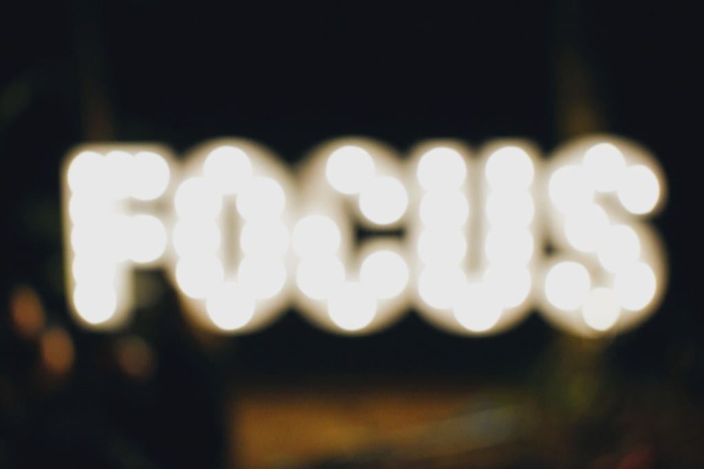 How to Stay Focused at Home 3 A close up of a logo
Description automatically generated