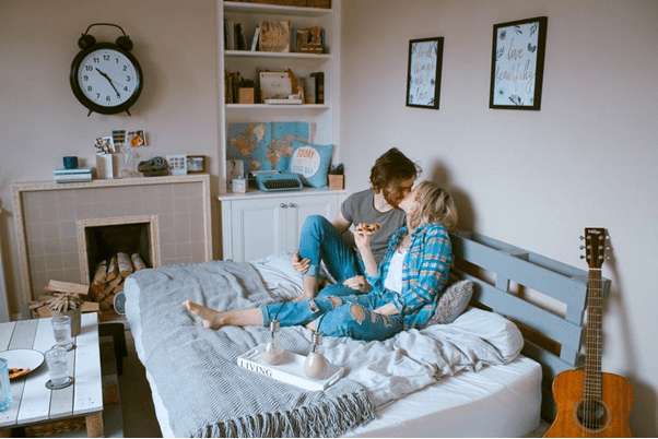 Love Languages: How to Use Acts of Service in Your Relationship 7 man and woman kissing on bed